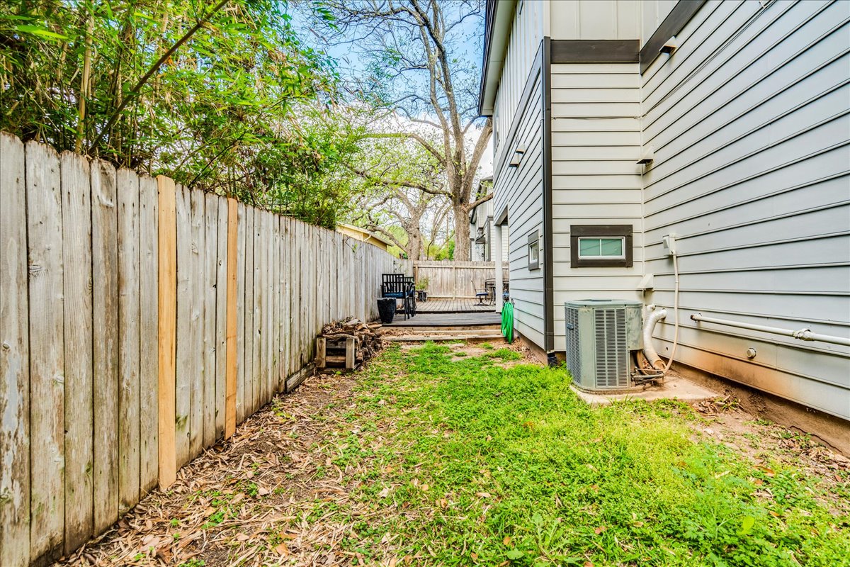 2115 Bluebonnet Lane, Unit 4A Austin, TX 78704 - Photo 26 of 29 a view of a house with backyard and sitting area