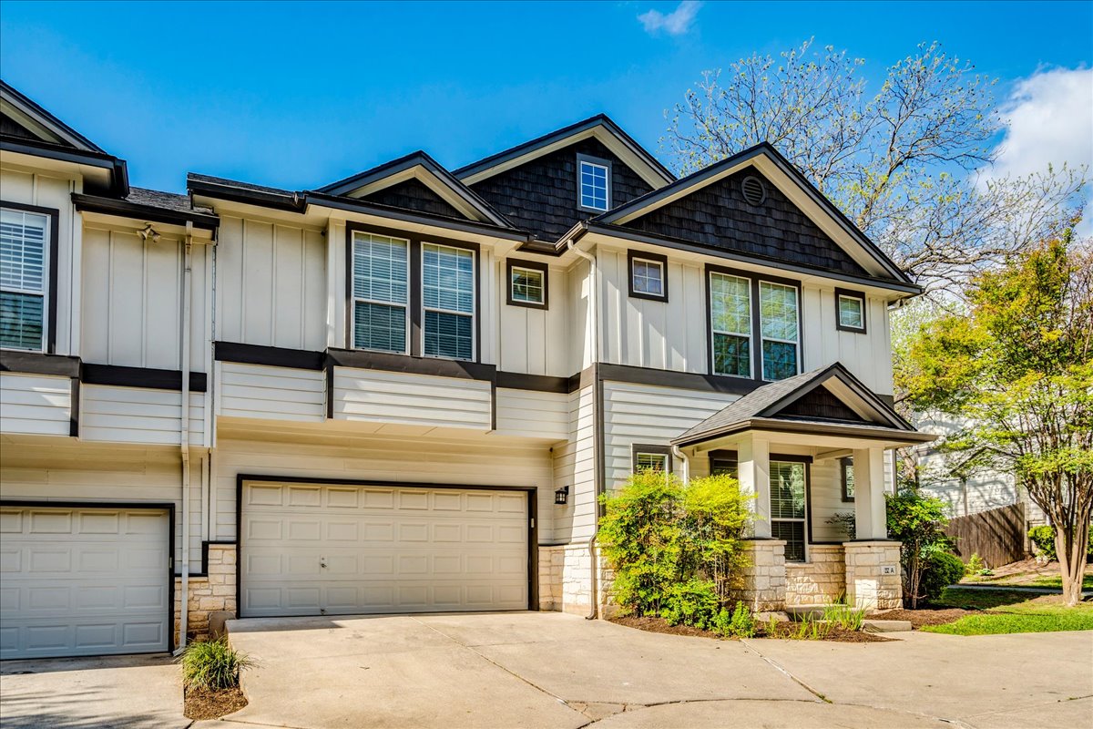 2115 Bluebonnet Lane, Unit 4A Austin, TX 78704 - Photo 29 of 29 a front view of a house with garden