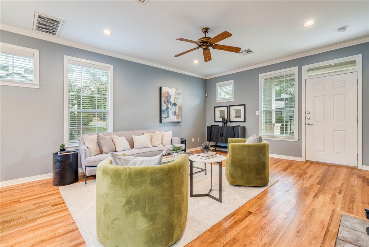2115 Bluebonnet Lane, Unit 4A Austin, TX 78704 - Photo 5 of 29 a living room with furniture and a wooden floor
