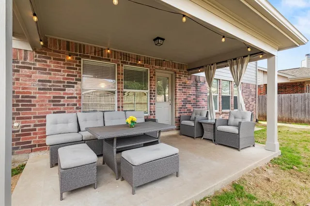 a outdoor living space with furniture and garden view