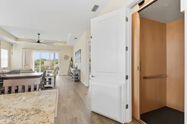 a bedroom with a bed dresser and a window