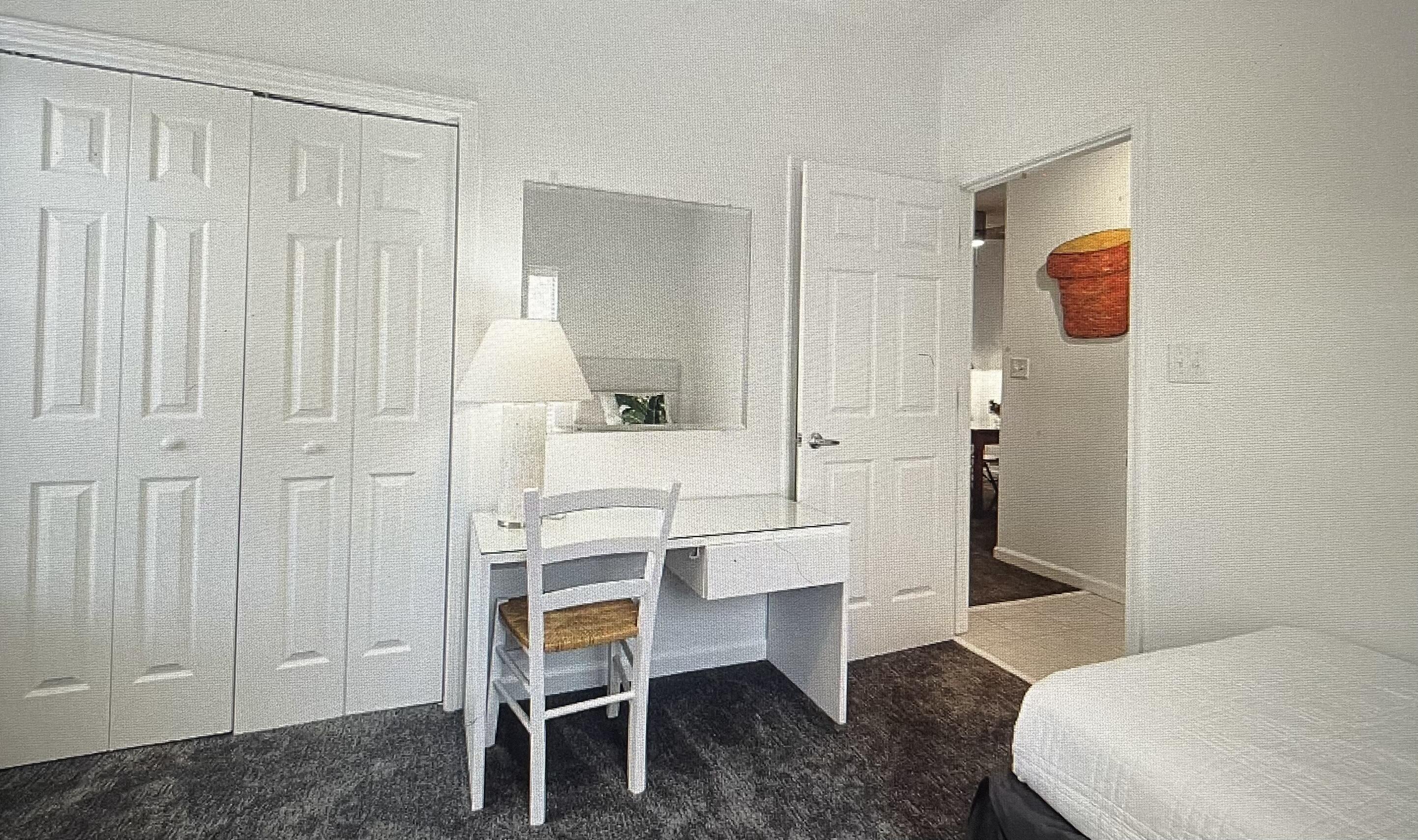 34 Heron's Watch Way, Unit 2304 Santa Rosa Beach, FL 32459 - Photo 16 of 56 a bedroom with a bed and a table in it