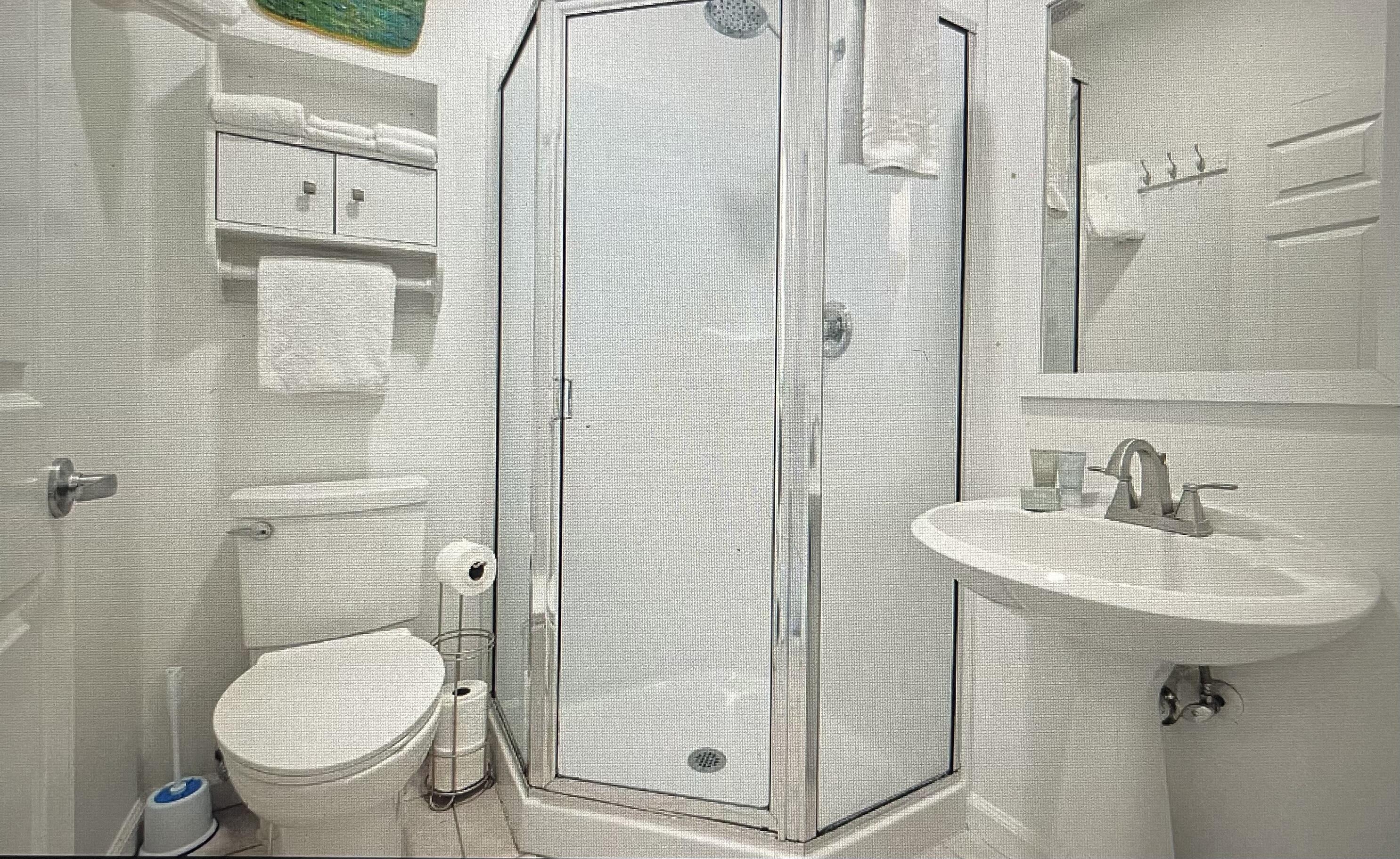 34 Heron's Watch Way, Unit 2304 Santa Rosa Beach, FL 32459 - Photo 17 of 56 a bathroom with a sink toilet and shower