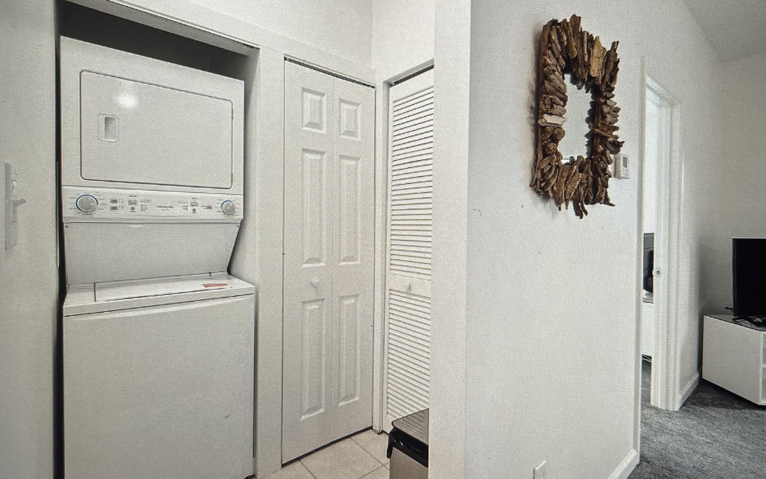 34 Heron's Watch Way, Unit 2304 Santa Rosa Beach, FL 32459 - Photo 18 of 56 a utility room with dryer and washer
