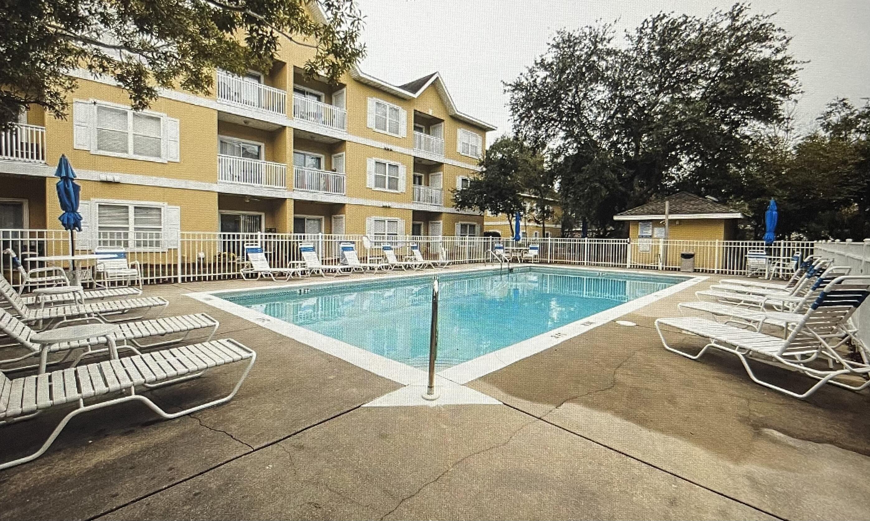 34 Heron's Watch Way, Unit 2304 Santa Rosa Beach, FL 32459 - Photo 2 of 56 a view of a patio with a yard
