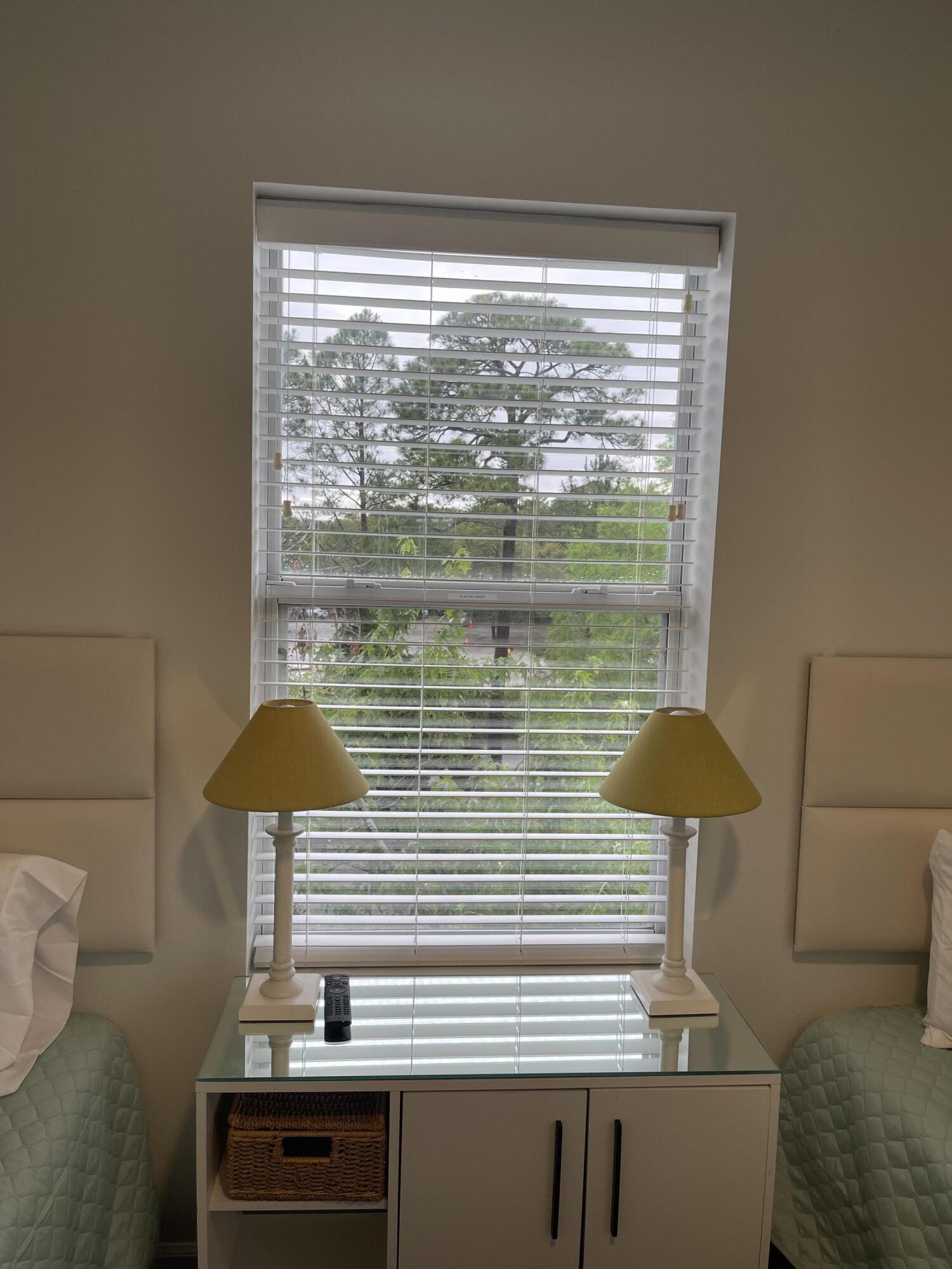 34 Heron's Watch Way, Unit 2304 Santa Rosa Beach, FL 32459 - Photo 29 of 56 a bathroom with a sink a mirror and a window
