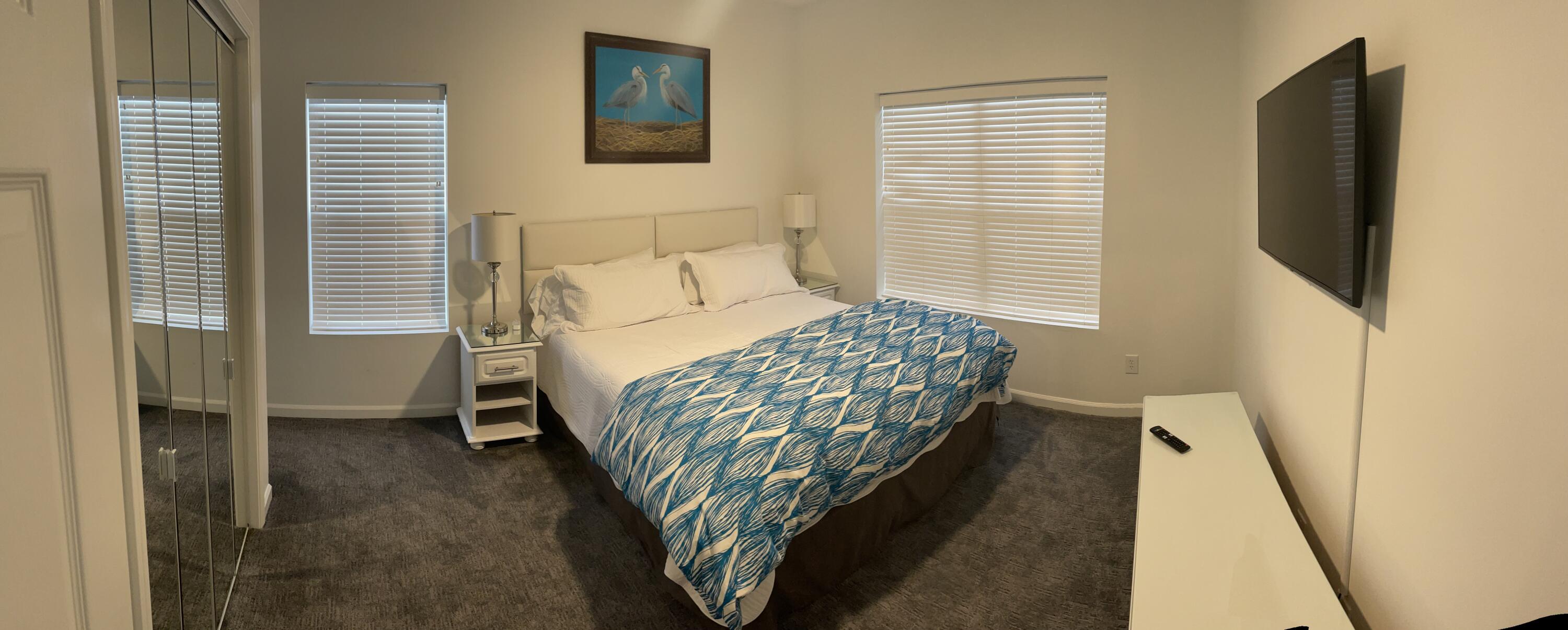 34 Heron's Watch Way, Unit 2304 Santa Rosa Beach, FL 32459 - Photo 36 of 56 a bed sitting in a bedroom next to a window