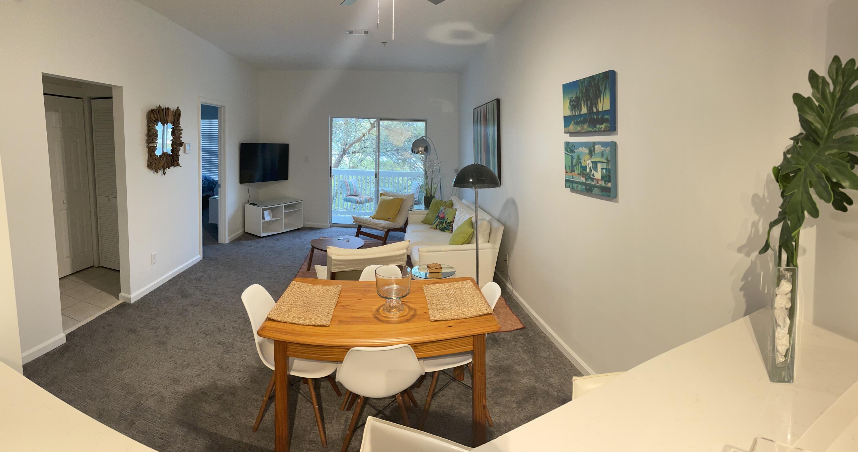 34 Heron's Watch Way, Unit 2304 Santa Rosa Beach, FL 32459 - Photo 40 of 56 a living room with furniture and a flat screen tv