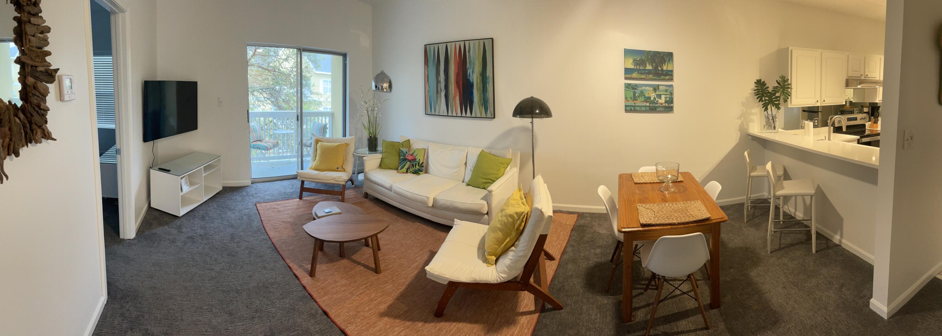 34 Heron's Watch Way, Unit 2304 Santa Rosa Beach, FL 32459 - Photo 41 of 56 a living room with furniture and a flat screen tv