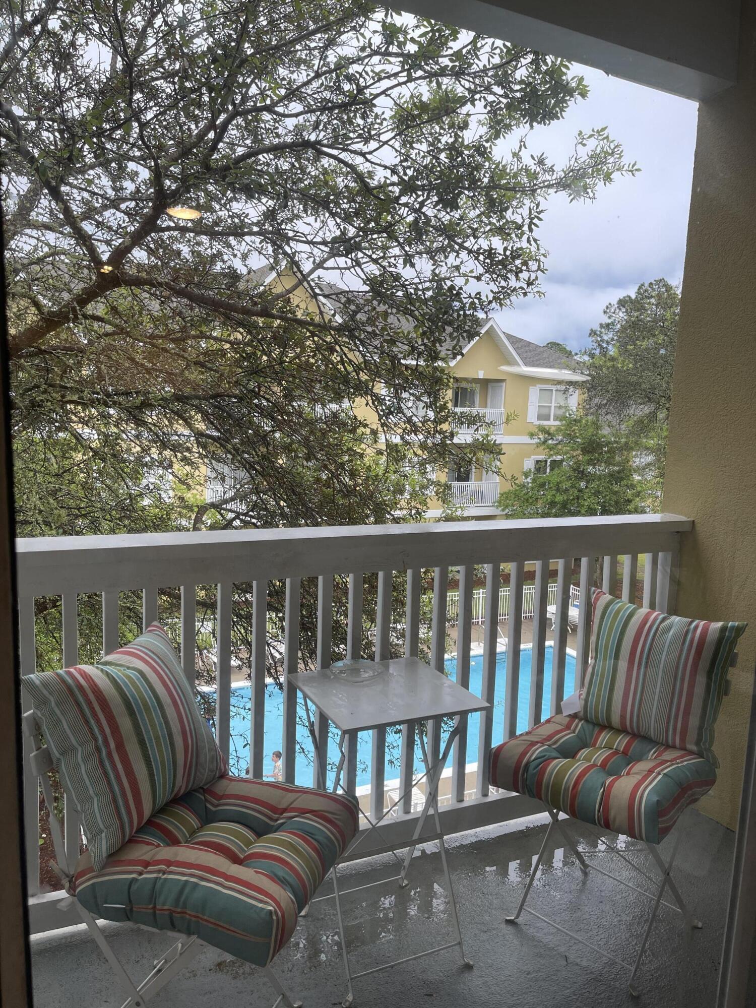 34 Heron's Watch Way, Unit 2304 Santa Rosa Beach, FL 32459 - Photo 44 of 56 a balcony with a couch