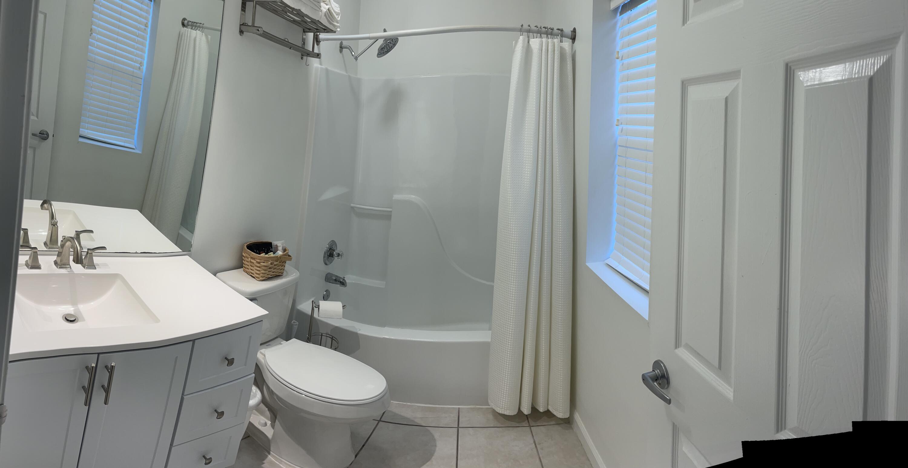 34 Heron's Watch Way, Unit 2304 Santa Rosa Beach, FL 32459 - Photo 55 of 56 a bathroom with a sink toilet and shower