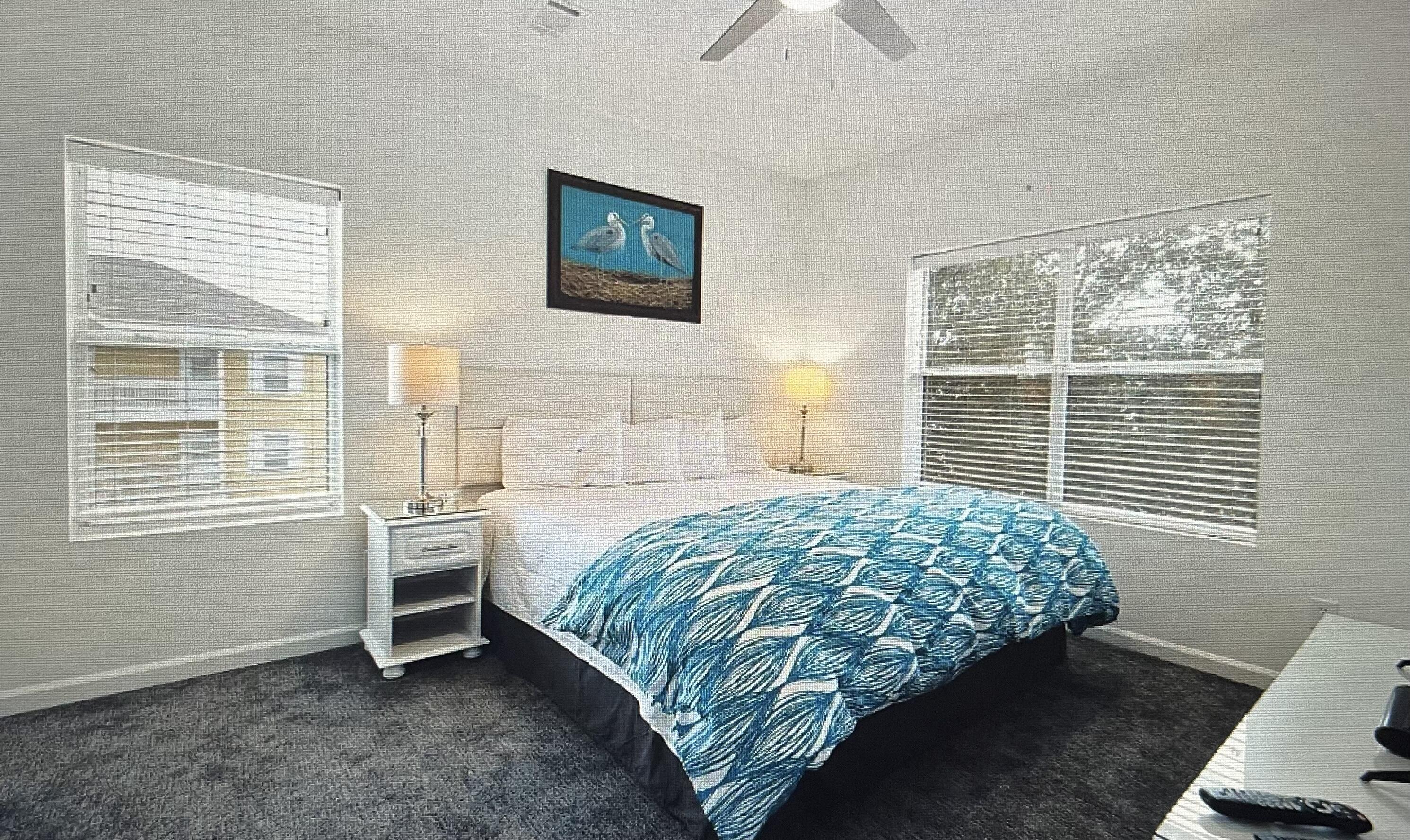 34 Heron's Watch Way, Unit 2304 Santa Rosa Beach, FL 32459 - Photo 10 of 56 a bedroom with a bed next to a window