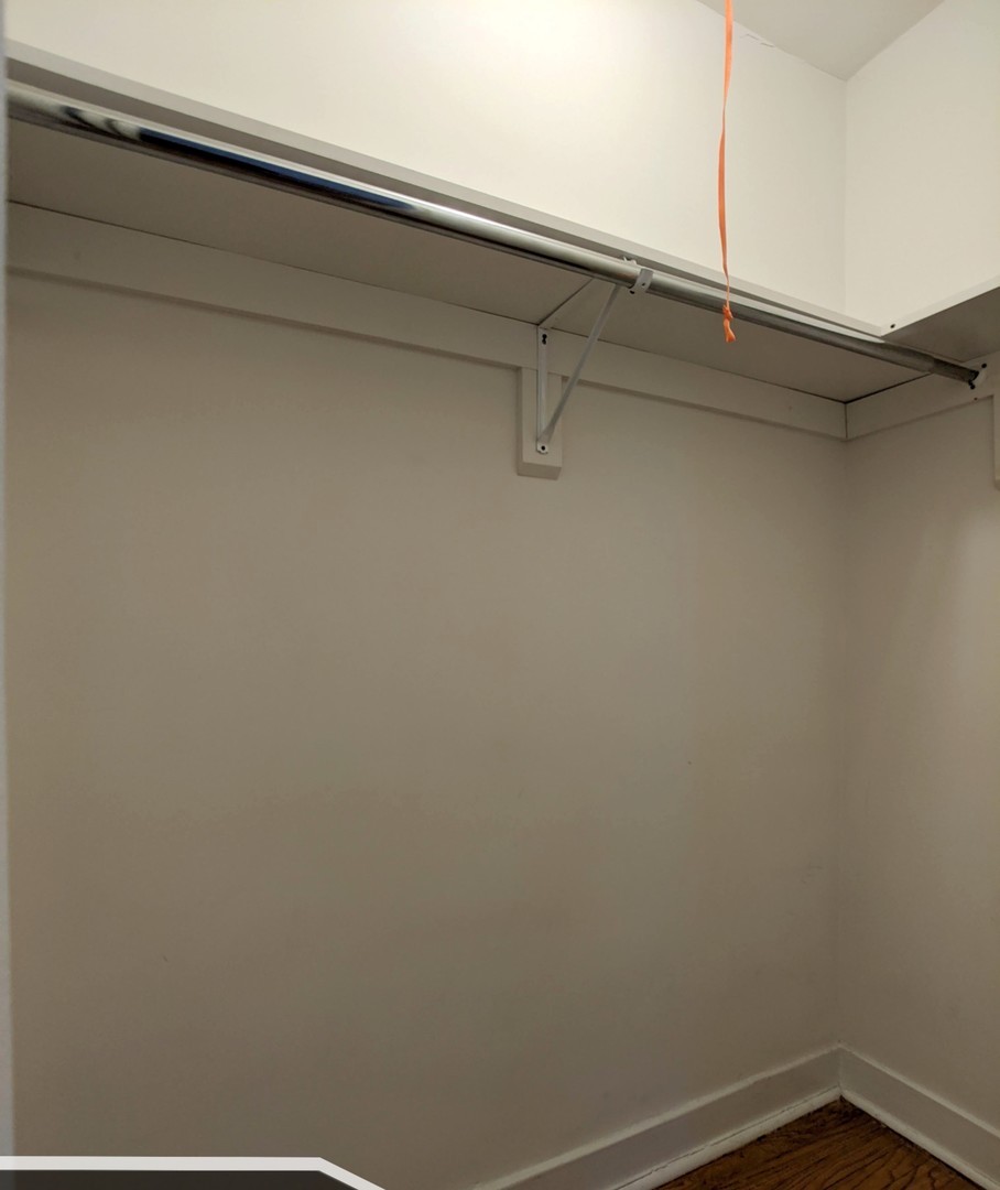 5027 North Harding Avenue, Unit 2W Chicago, IL 60625 - Photo 16 of 20 a close up view of racks on the wall