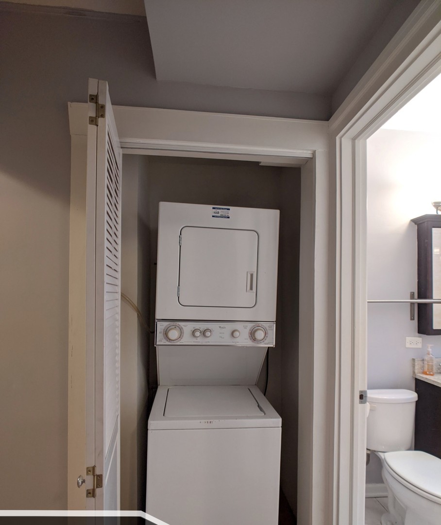 5027 North Harding Avenue, Unit 2W Chicago, IL 60625 - Photo 18 of 20 a utility room with dryer and washer