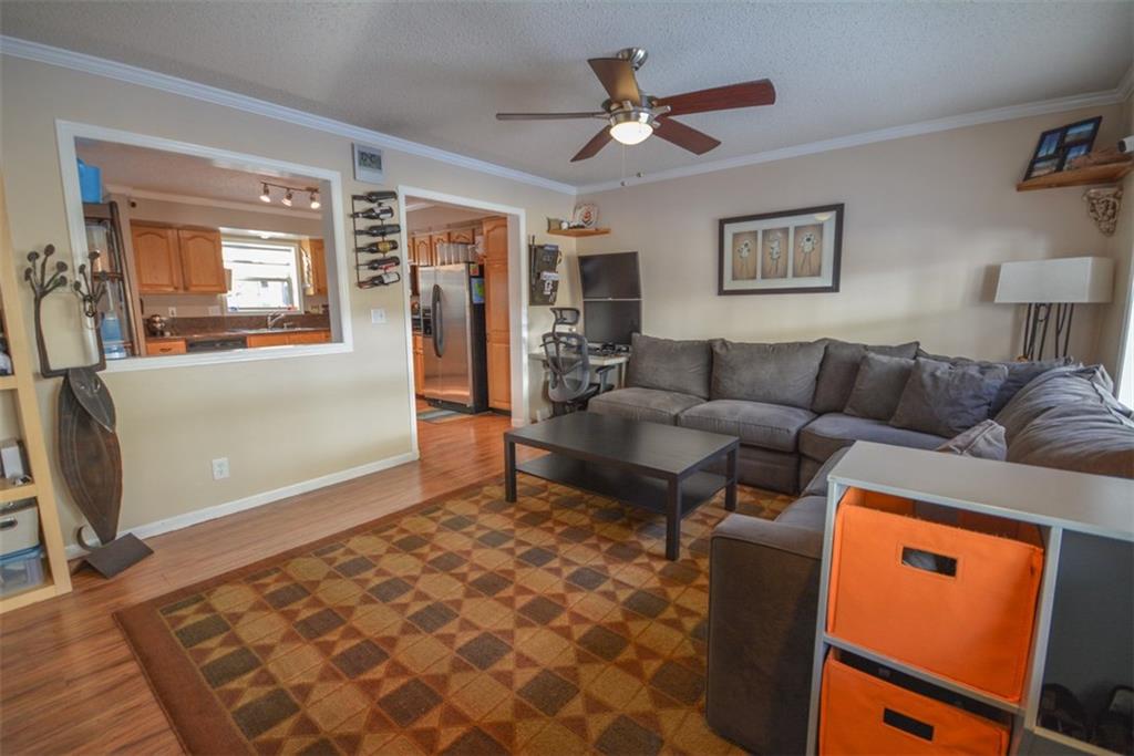 257 Huron Road, Unit E24 Breckenridge, CO 80424 - Photo 2 of 29 a living room with furniture and a window