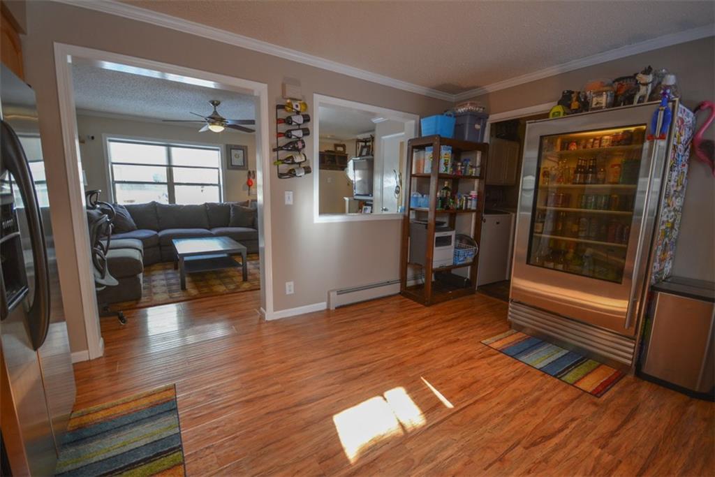 257 Huron Road, Unit E24 Breckenridge, CO 80424 - Photo 11 of 29 a view of empty room with wooden floor and fan