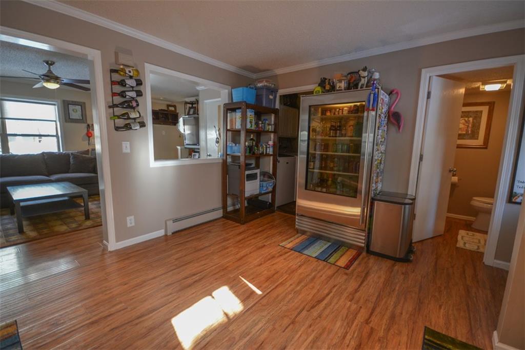 257 Huron Road, Unit E24 Breckenridge, CO 80424 - Photo 12 of 29 a view of empty room with wooden floor and fan