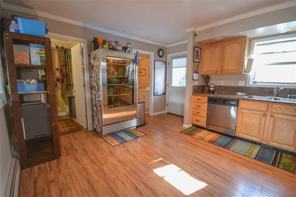 257 Huron Road, Unit E24 Breckenridge, CO 80424 - Photo 13 of 29 a kitchen with stainless steel appliances granite countertop a refrigerator a stove and a wooden floors