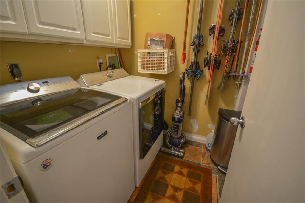 257 Huron Road, Unit E24 Breckenridge, CO 80424 - Photo 14 of 29 a utility room with dryer and washer