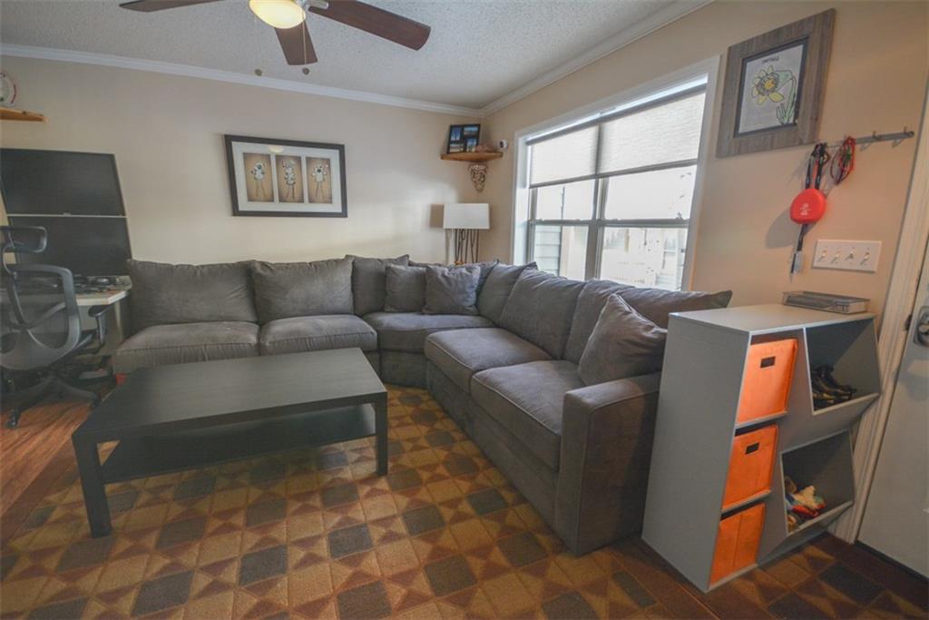 257 Huron Road, Unit E24 Breckenridge, CO 80424 - Photo 3 of 29 a living room with furniture and a window