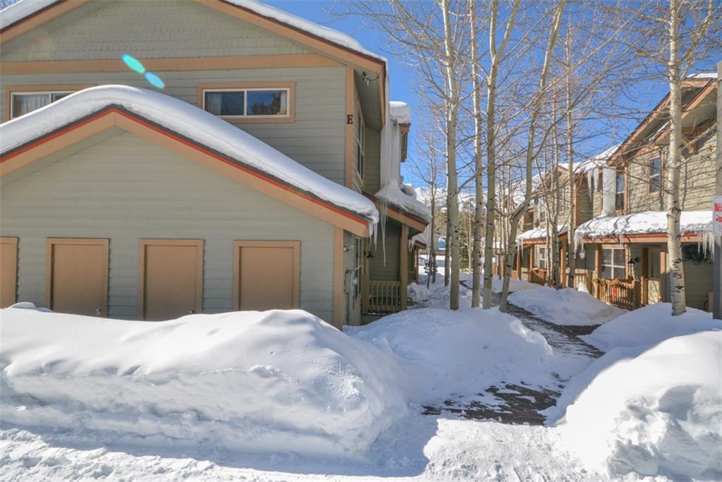 257 Huron Road, Unit E24 Breckenridge, CO 80424 - Photo 28 of 29 a view of a house with a yard
