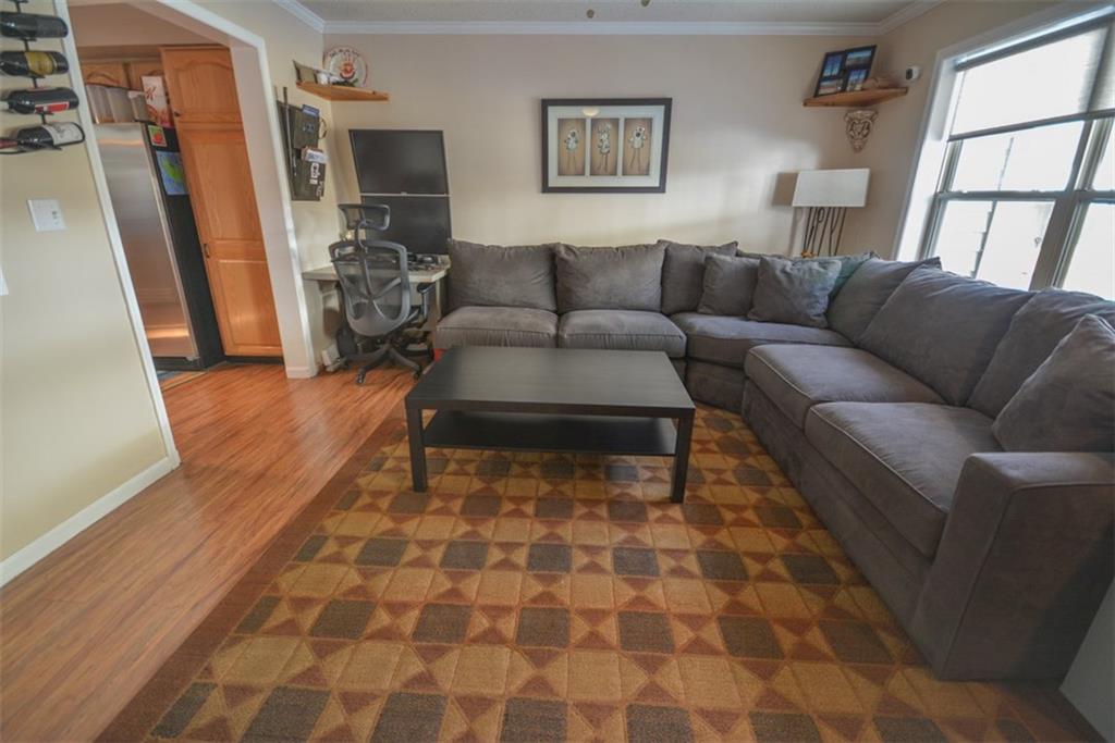 257 Huron Road, Unit E24 Breckenridge, CO 80424 - Photo 4 of 29 a living room with furniture and a rug