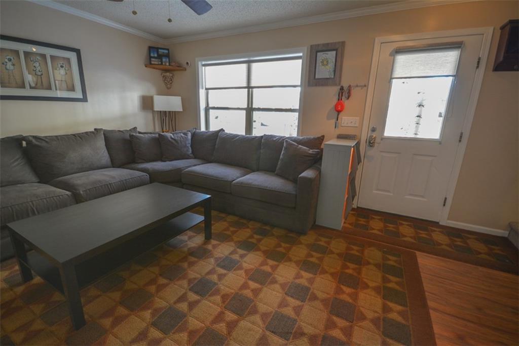 257 Huron Road, Unit E24 Breckenridge, CO 80424 - Photo 5 of 29 a living room with furniture and a window