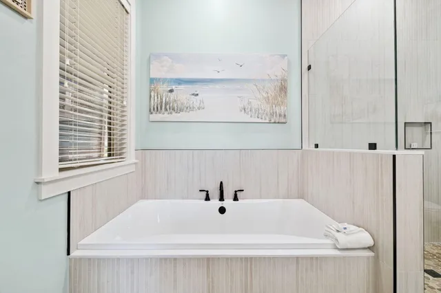 a bathroom with a bathtub