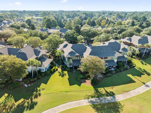 an aerial view of a house with a garden