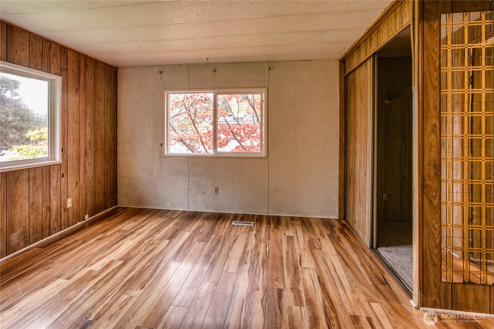 3496 Birch Bay Lynden Road Custer, WA 98240 - Photo 17 of 24 an empty room with wooden floor and windows