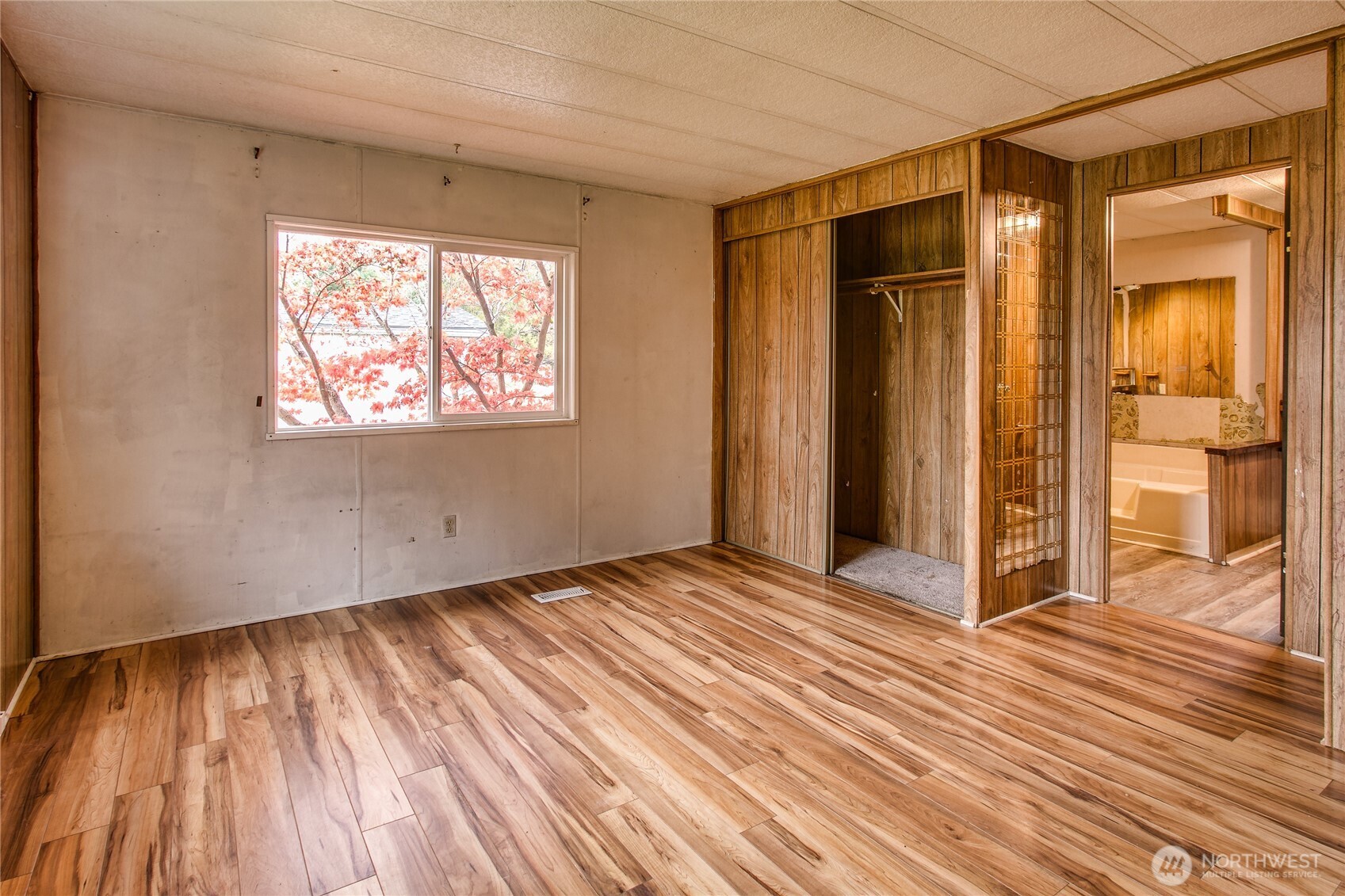 3496 Birch Bay Lynden Road Custer, WA 98240 - Photo 18 of 24 an empty room with wooden floor and windows