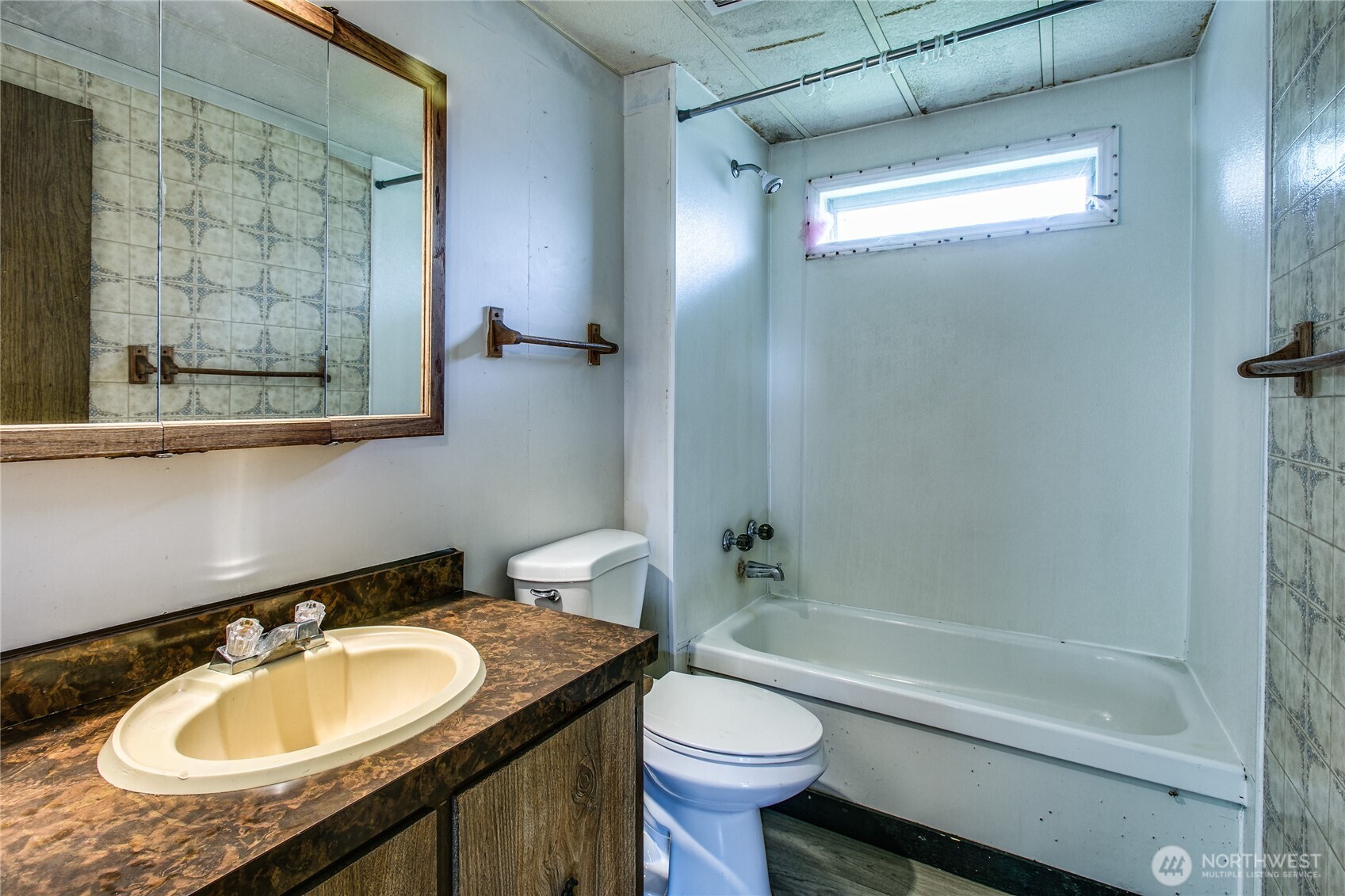 3496 Birch Bay Lynden Road Custer, WA 98240 - Photo 21 of 24 a bathroom with a granite countertop sink toilet mirror and a bathtub