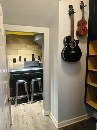 a en suite bathroom with a sink and a mirror