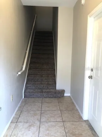 a view of entryway and hall with a window