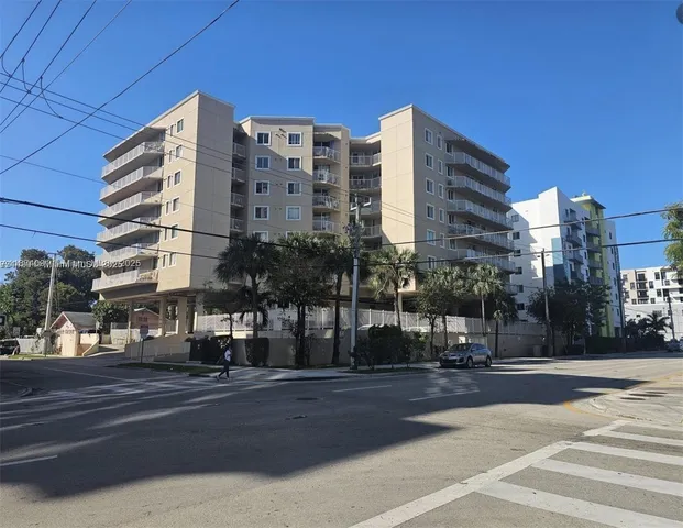 a city street lined with tall buildings