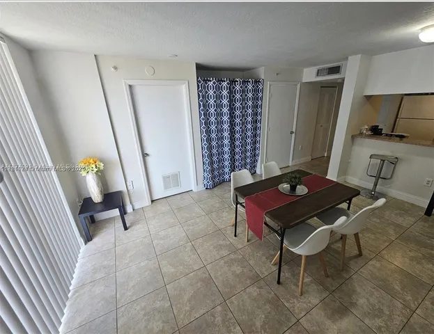 a room with furniture and a rug