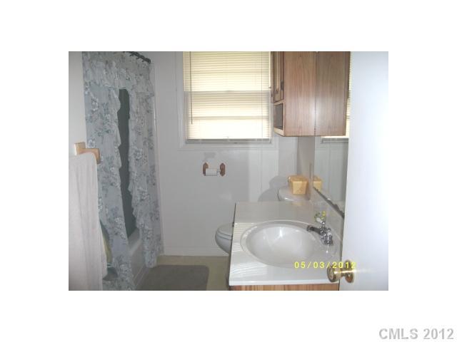 194 Kidd Road Fort Mill, SC 29708 - Photo 8 of 15 a bathroom with a sink and a mirror