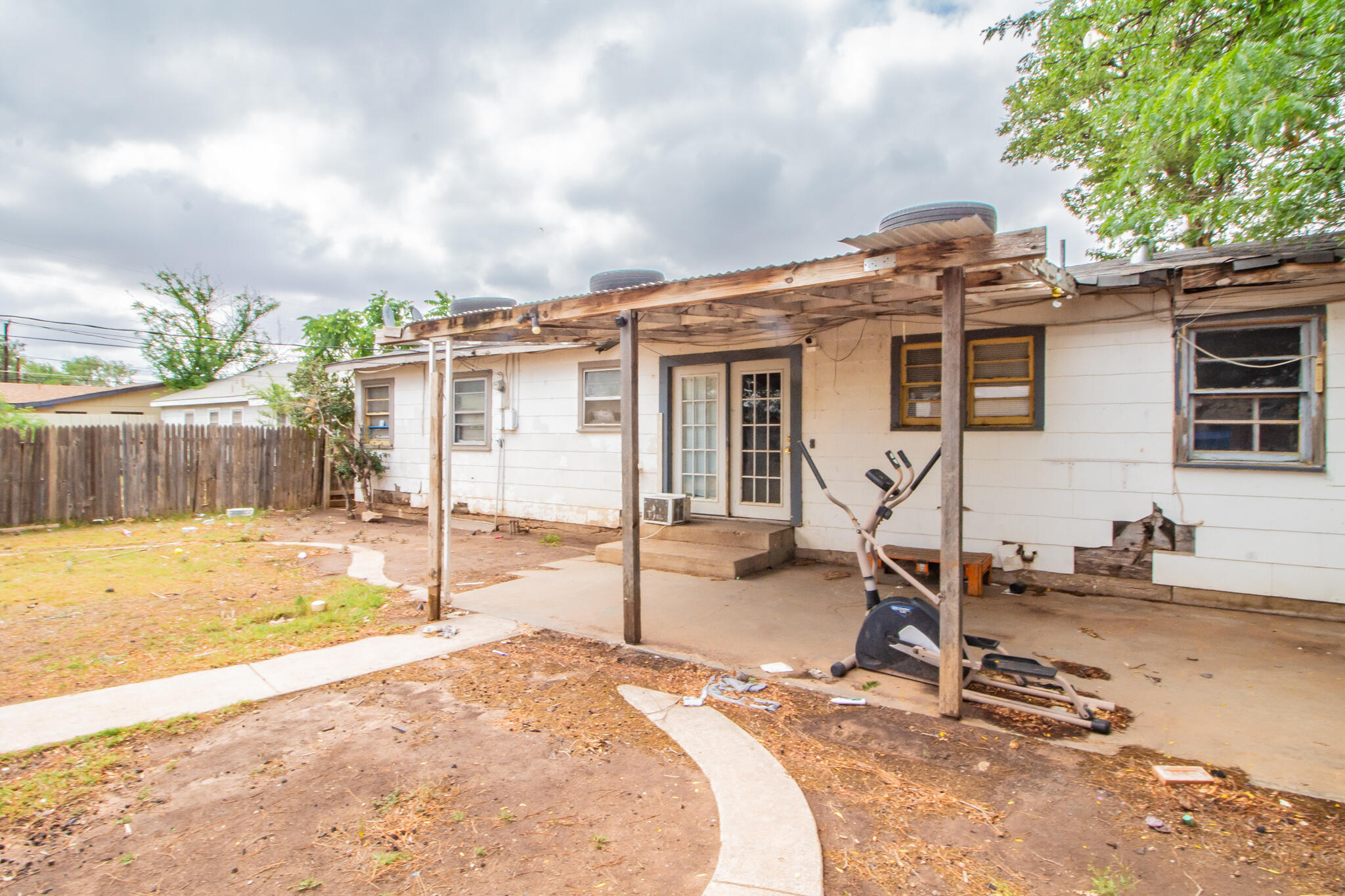 1606 60th Street Lubbock, TX 79412 - Photo 12 of 12 a view of a house with a patio
