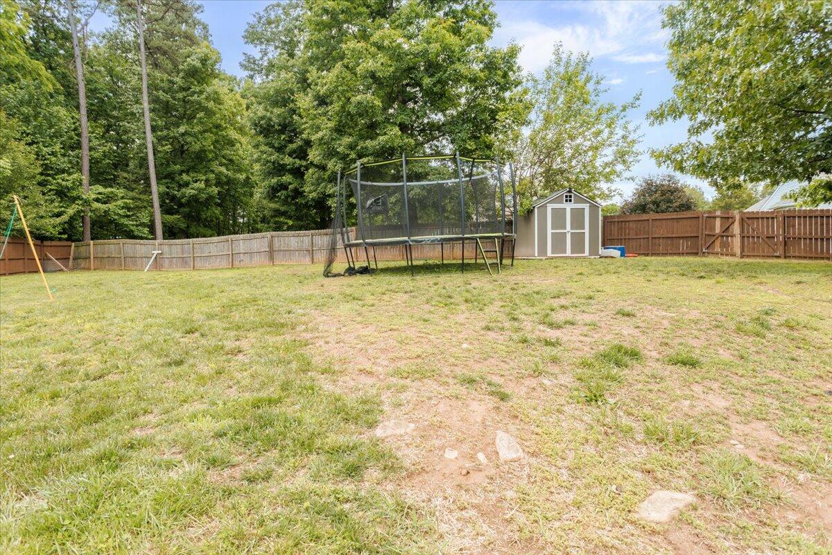 4541 Lomond Circle Salem, VA 24153 - Photo 12 of 13 a swimming pool with trees in the background