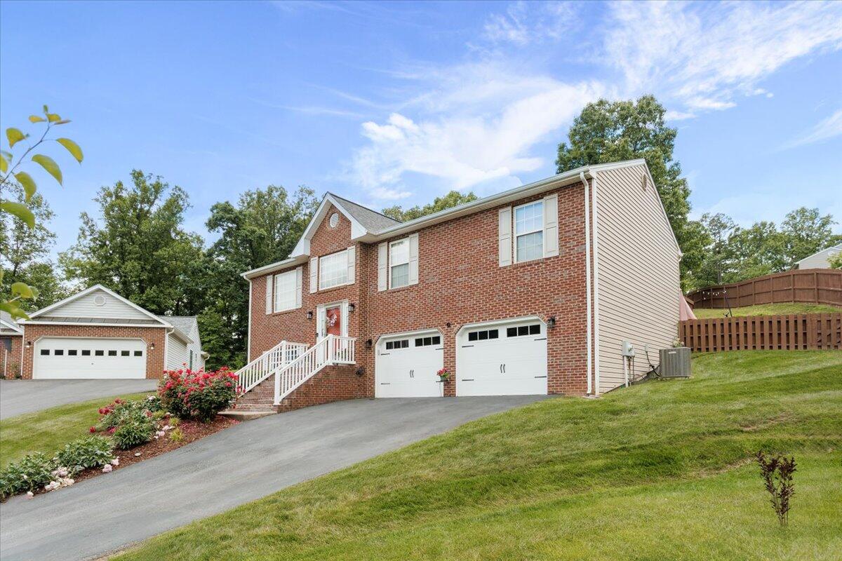 4541 Lomond Circle Salem, VA 24153 - Photo 2 of 13 a view of a house with a yard and a large tree