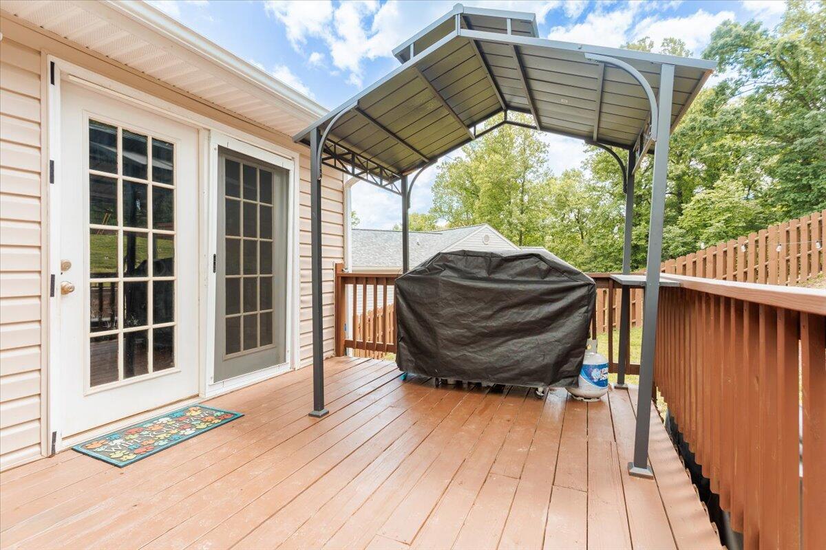 4541 Lomond Circle Salem, VA 24153 - Photo 8 of 13 a view of roof deck with wooden floor and outdoor seating