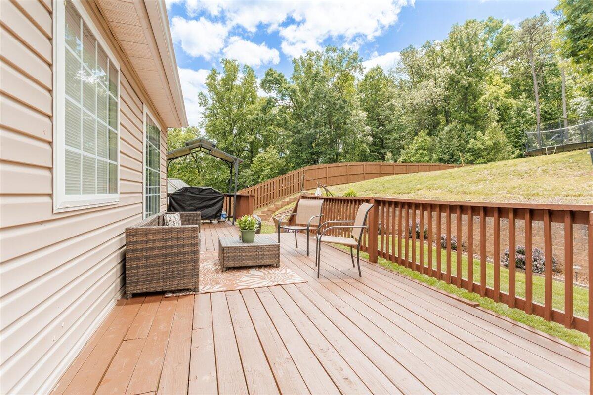 4541 Lomond Circle Salem, VA 24153 - Photo 9 of 13 a view of balcony with wooden floor and seating space