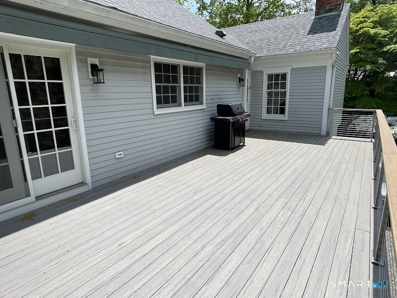 9 Tory Hole Road Darien, CT 06820 - Photo 30 of 33 a backyard of a house with seating space