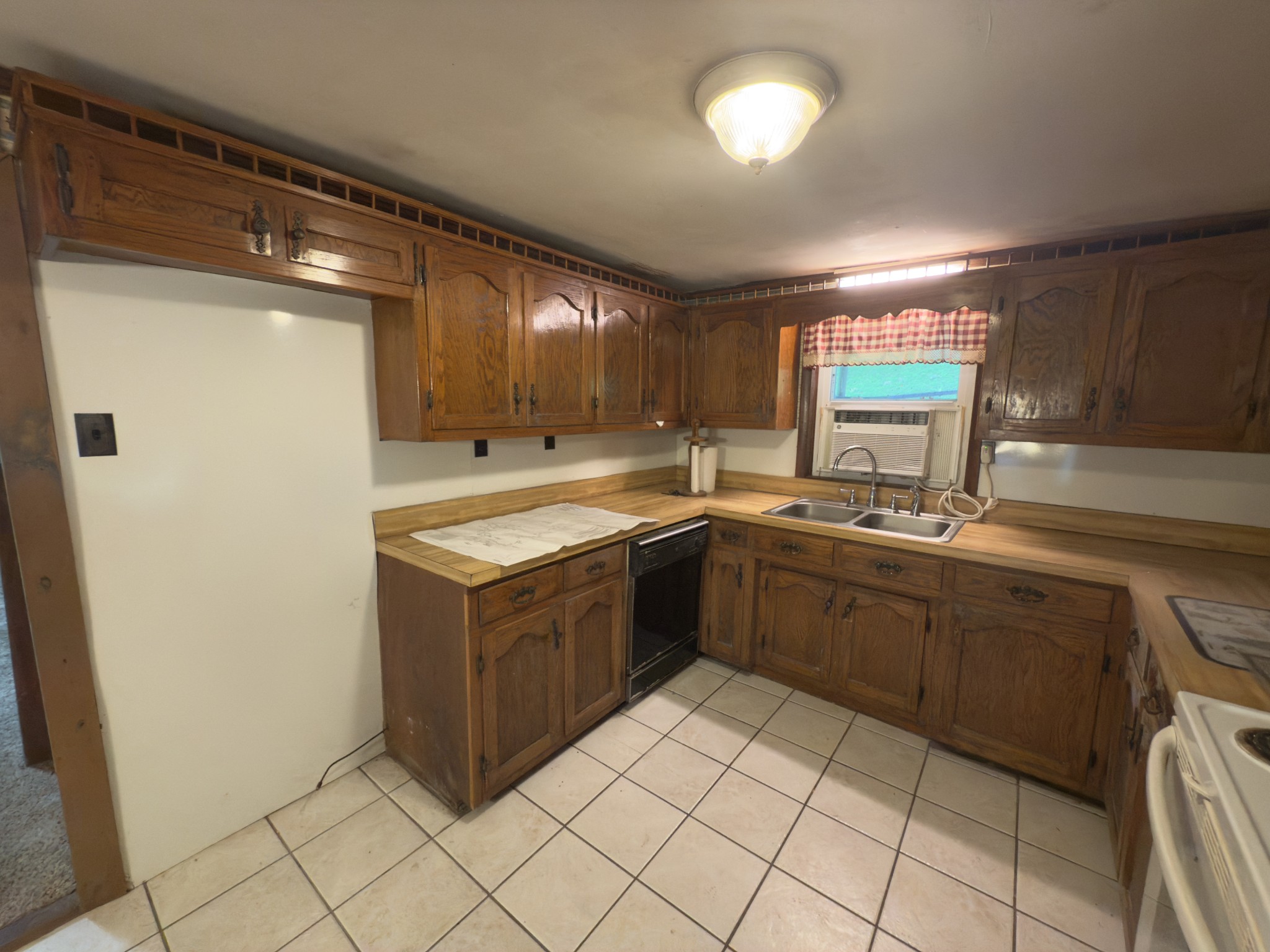 546 Womack Hollow Road Liberty, TN 37095 - Photo 27 of 43 a kitchen with a sink cabinets and window