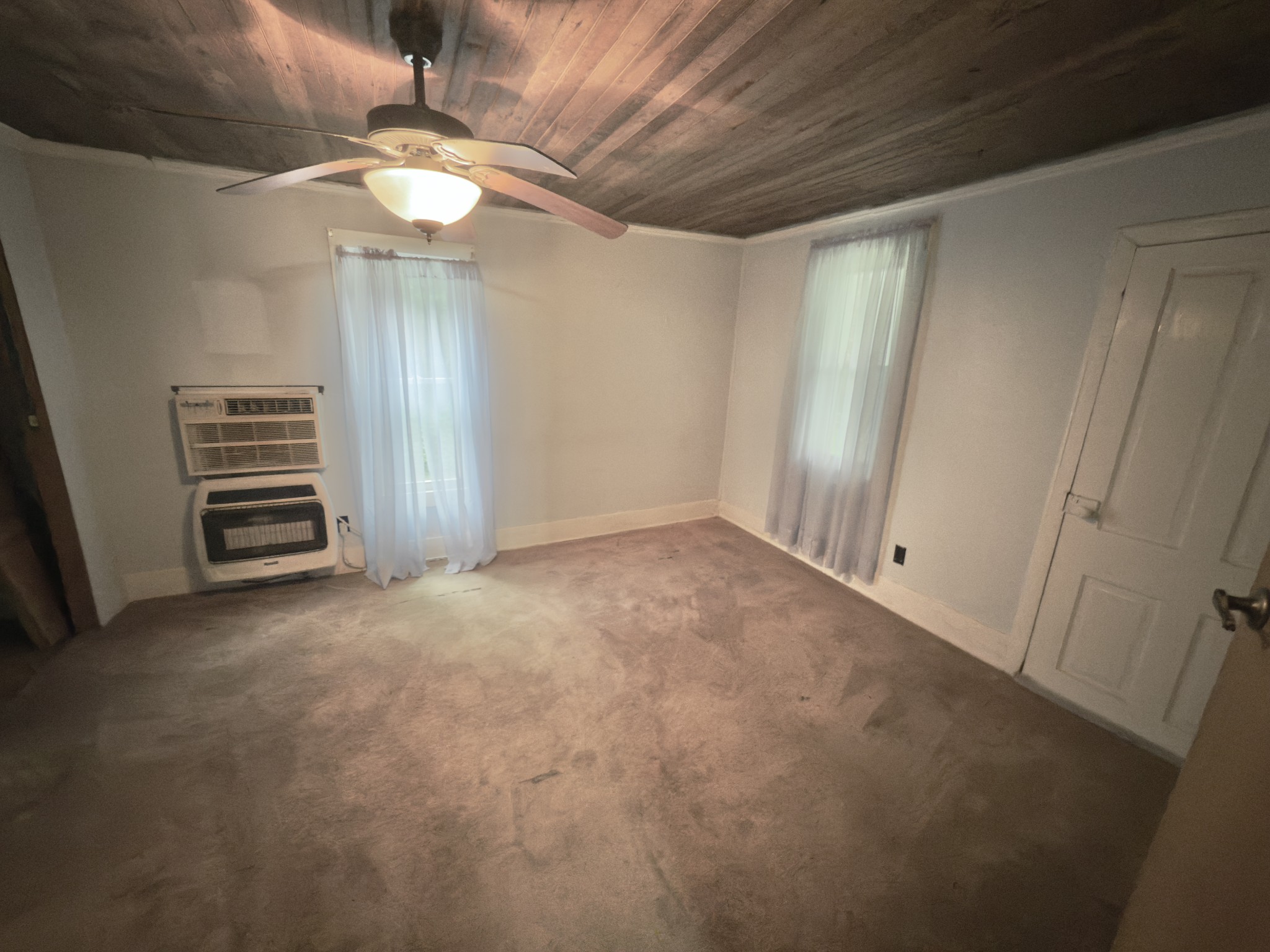 546 Womack Hollow Road Liberty, TN 37095 - Photo 29 of 43 wooden floor in an empty room with a window