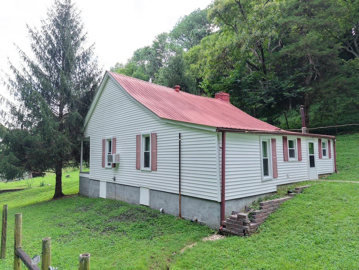 546 Womack Hollow Road Liberty, TN 37095 - Photo 5 of 43 a view of a house with a yard