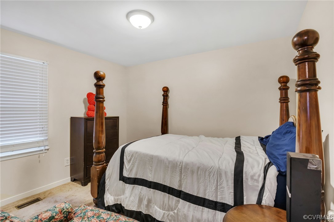 4211 Bridgewood Road Midlothian, VA 23112 - Photo 14 of 27 a bedroom with bed and a window