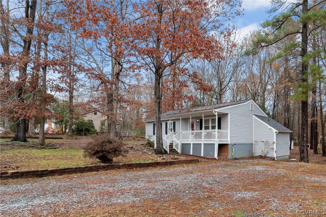 4211 Bridgewood Road Midlothian, VA 23112 - Photo 19 of 27 a front view of a house with a garden