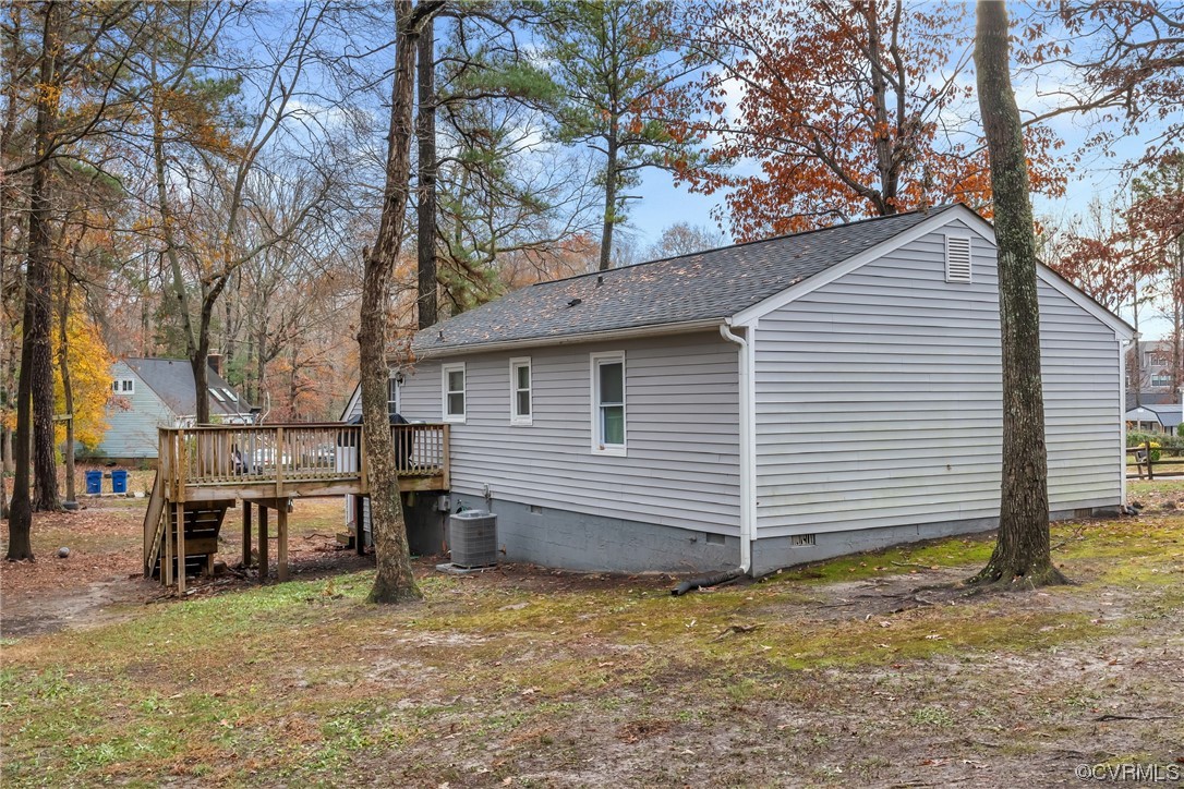 4211 Bridgewood Road Midlothian, VA 23112 - Photo 22 of 27 a view of a house with a yard and large tree