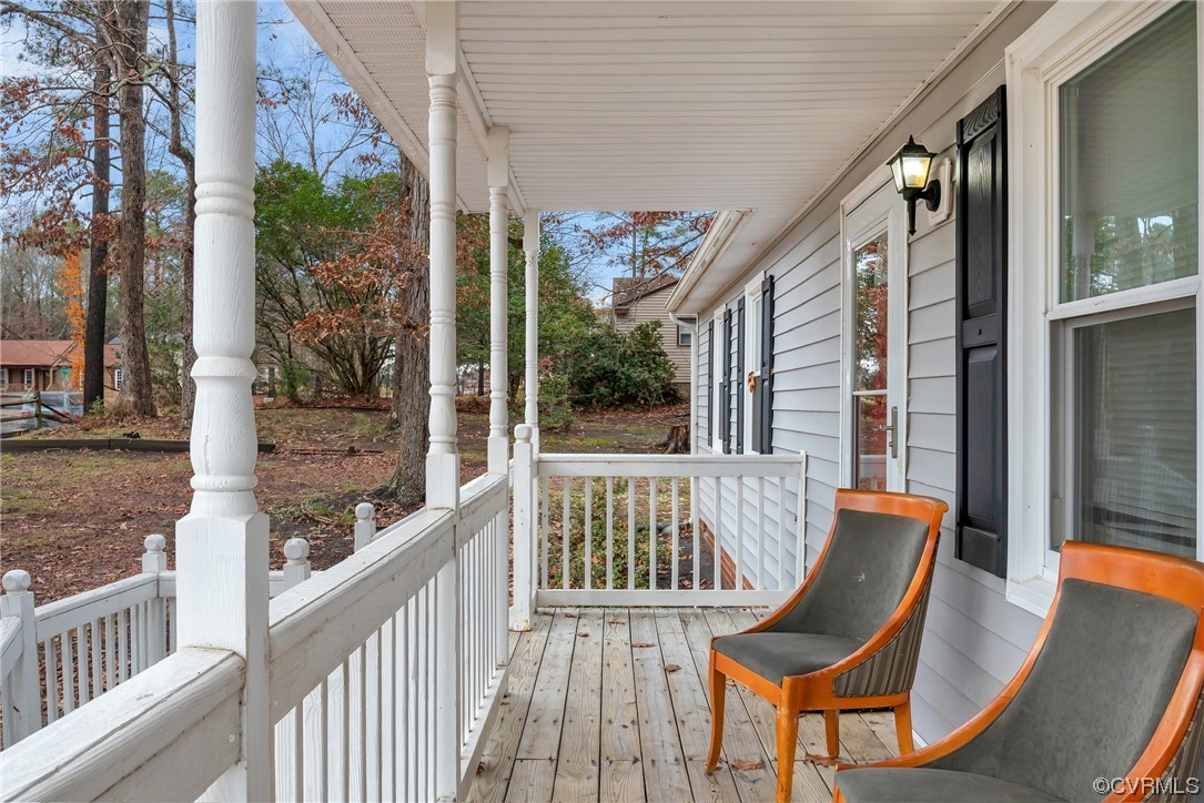 4211 Bridgewood Road Midlothian, VA 23112 - Photo 3 of 27 a view of a two chairs in the balcony